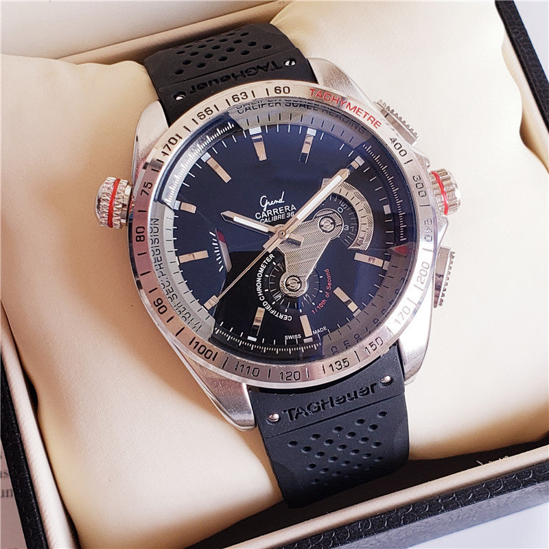 Mechanical Watches displayed in a close-up view featuring a TAG Heuer Carrera with black rubber strap.
