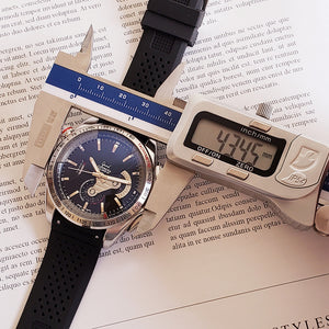 Mechanical Watches being measured with a caliper for precise dimensions and craftsmanship detail.